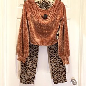 Cliche’ off the shoulder crop sweater.